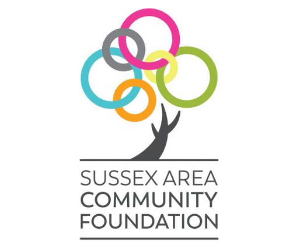 Un logo représentant un arbre dont le feuillage est constitué d'anneaux circulaires colorés, au-dessus du texte « Sussex Area Community Foundation ».