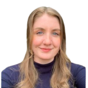 Le français suit.<br />
A picture of a person with long blonde hair wearing a blue turtleneck smiling at the camera, framed by an orange circle.<br />
Photo d'une personne aux longs cheveux blonds, portant un col roulé bleu et souriant à l'appareil photo, encadrée d'un cercle orange.